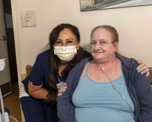 Healthcare Worker and Patient Smiling
